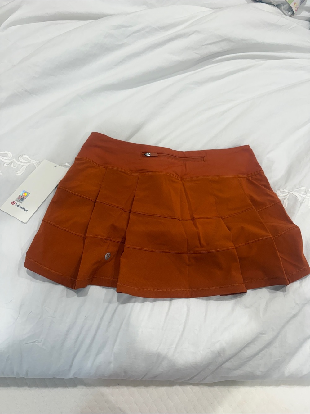 lululemon athletica Pace Rival MR Skirt in burnt orange with white tag - Picture 5 of 9